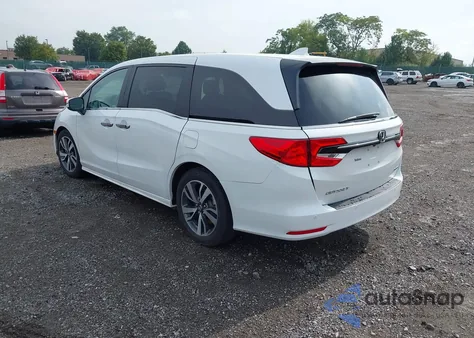 2023 Honda Odyssey Touring z USA, uszkodzony, nr VIN 5FNRL6H80PB004704